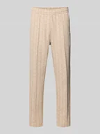 Spodnie sportowe męskie - Spodnie dresowe o kroju regular fit z dodatkiem bawełny - miniaturka - grafika 1