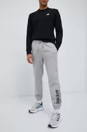 Spodnie męskie - adidas spodnie dresowe kolor szary z nadrukiem - miniaturka - grafika 1