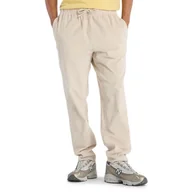 Spodnie sportowe męskie - Spodnie męskie New Balance MP53521TWF - beżowe - miniaturka - grafika 1