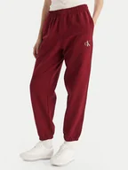 Spodnie sportowe damskie - Calvin Klein Jeans Spodnie dresowe Monologo LV047B235G Bordowy Regular Fit - miniaturka - grafika 1