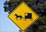 Plakaty - A caution sign to auto drivers to be on the lookout for Amish horses and buggies, Carol Highsmith - plakat 80x60 cm - miniaturka - grafika 1