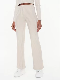 Spodnie damskie - Calvin Klein Jeans Spodnie materiałowe J20J220678 Beżowy Flare Fit - grafika 1
