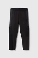 Spodnie i spodenki dla dziewczynek - adidas spodnie dresowe dziecięce kolor czarny z nadrukiem - miniaturka - grafika 1