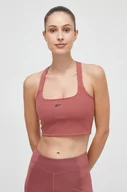 Koszulki sportowe damskie - Reebok top do jogi kolor różowy - miniaturka - grafika 1