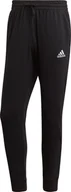Spodnie sportowe męskie - Adidas Spodnie adidas Essentials Tapered Cuff Pants GK9226 GK9226 czarny S - miniaturka - grafika 1