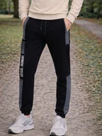 Dresy męskie - Spodnie dresowe z kieszeniami czarny M - miniaturka - grafika 1