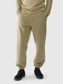Spodnie męskie - Spodnie dresowe oversize męskie 4F 4FWAW24TTROM0824-44S Zielony - miniaturka - grafika 1
