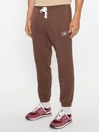 Spodnie sportowe męskie - New Balance Spodnie dresowe NB Essentials Sweatpant MP33509 Brązowy Regular Fit - miniaturka - grafika 1