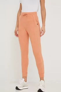Spodnie damskie - Rip Curl spodnie dresowe damskie kolor pomarańczowy gładkie - grafika 1