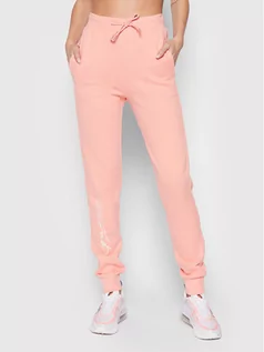 Spodnie sportowe damskie - Guess Spodnie dresowe V2RB18 KAOR1 Różowy Regular Fit - grafika 1