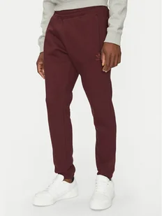 adidas Spodnie dresowe Trefoil Essentials JD2420 Bordowy Slim Fit - Spodnie sportowe męskie - miniaturka - grafika 1