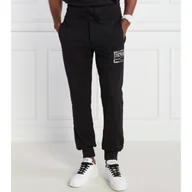 Dresy męskie - Versace Jeans Couture Spodnie dresowe | Oversize fit - miniaturka - grafika 1