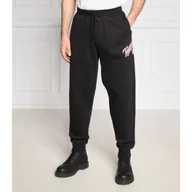 Dresy męskie - Tommy Jeans Spodnie dresowe COLLEGE 85 | Regular Fit - miniaturka - grafika 1