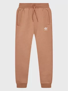 Odzież sportowa dziecięca - adidas Spodnie dresowe IC6134 Różowy Regular Fit - grafika 1