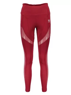 Spodnie sportowe damskie - adidas Legginsy sportowe "Adicolor Trefoil" w kolorze czerwonym - grafika 1