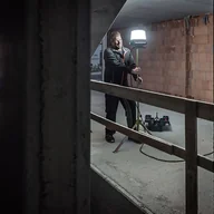 Oświetlenie warsztatowe - Reflektor budowlany LED ORUM 5050 M 360° gniazdo - miniaturka - grafika 1