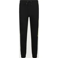 Spodnie i spodenki dla dziewczynek - Guess Spodnie dresowe Regular Fit - miniaturka - grafika 1