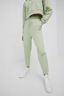 Spodnie damskie - Ellesse spodnie dresowe bawełniane damskie kolor zielony gładkie - grafika 1