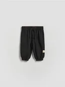 Spodenki dla niemowląt - Reserved - Bawełniane spodnie - czarny - miniaturka - grafika 1