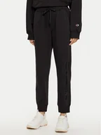 Spodnie sportowe damskie - Champion Spodnie dresowe 117584 Czarny Slim Fit - miniaturka - grafika 1