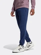 Spodnie sportowe męskie - adidas Spodnie dresowe w kolorze granatowym - miniaturka - grafika 1