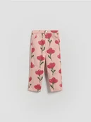 Spodnie i spodenki dla dziewczynek - Reserved - Wzorzyste spodnie - pastelowy róż - miniaturka - grafika 1