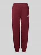 Spodnie sportowe damskie - Spodnie dresowe o kroju slim fit z wyhaftowanym logo - miniaturka - grafika 1