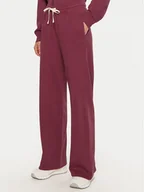 Spodnie sportowe damskie - Champion Spodnie dresowe 117638 Czerwony Wide Leg - miniaturka - grafika 1