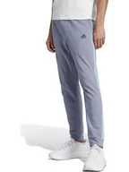Spodnie sportowe męskie - adidas Spodnie dresowe w kolorze błękitnym - miniaturka - grafika 1