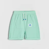 Spodenki dla niemowląt - Reserved - Bawełniane szorty z kieszenią - Turkusowy - miniaturka - grafika 1