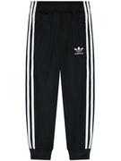 Spodnie i spodenki dla chłopców - Adidas Spodnie dresowe Sst Track GN8453 Czarny Regular Fit - miniaturka - grafika 1