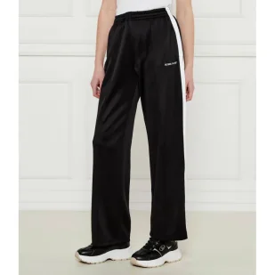 Guess Jeans Spodnie dresowe TRICOT Relaxed fit - Dresy damskie - miniaturka - grafika 1