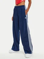Spodnie sportowe damskie - adidas Spodnie dresowe Firebird IL3817 Granatowy Loose Fit - miniaturka - grafika 1
