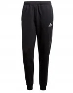 Spodnie sportowe męskie - Spodnie dresowe Adidas z kieszeniami bawełniane - miniaturka - grafika 1