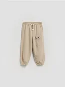 Spodenki dla niemowląt - Reserved - Spodnie z aplikacją - beżowy - miniaturka - grafika 1