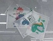 Teczki i skoroszyty - Teczka A4 plastikowa zapinana dinozaury (12szt) - miniaturka - grafika 1