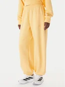 Spodnie sportowe damskie - adidas Spodnie dresowe Soft Lux KA7020 Pomarańczowy Loose Fit - miniaturka - grafika 1