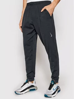 Spodnie sportowe męskie - Nike Spodnie dresowe Yoga Dri-FIT CZ2208 Czarny Standard Fit - grafika 1