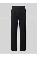 Spodnie męskie - Spodnie materiałowe o kroju slim tapered fit z zakładkami w pasie - CK Calvin Klein - miniaturka - grafika 1
