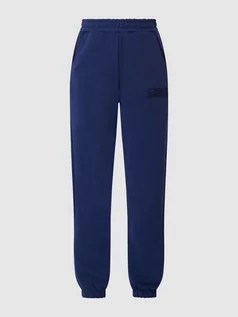 Spodnie sportowe damskie - Spodnie dresowe z mieszanki bawełny model ‘Bandirma’ - grafika 1