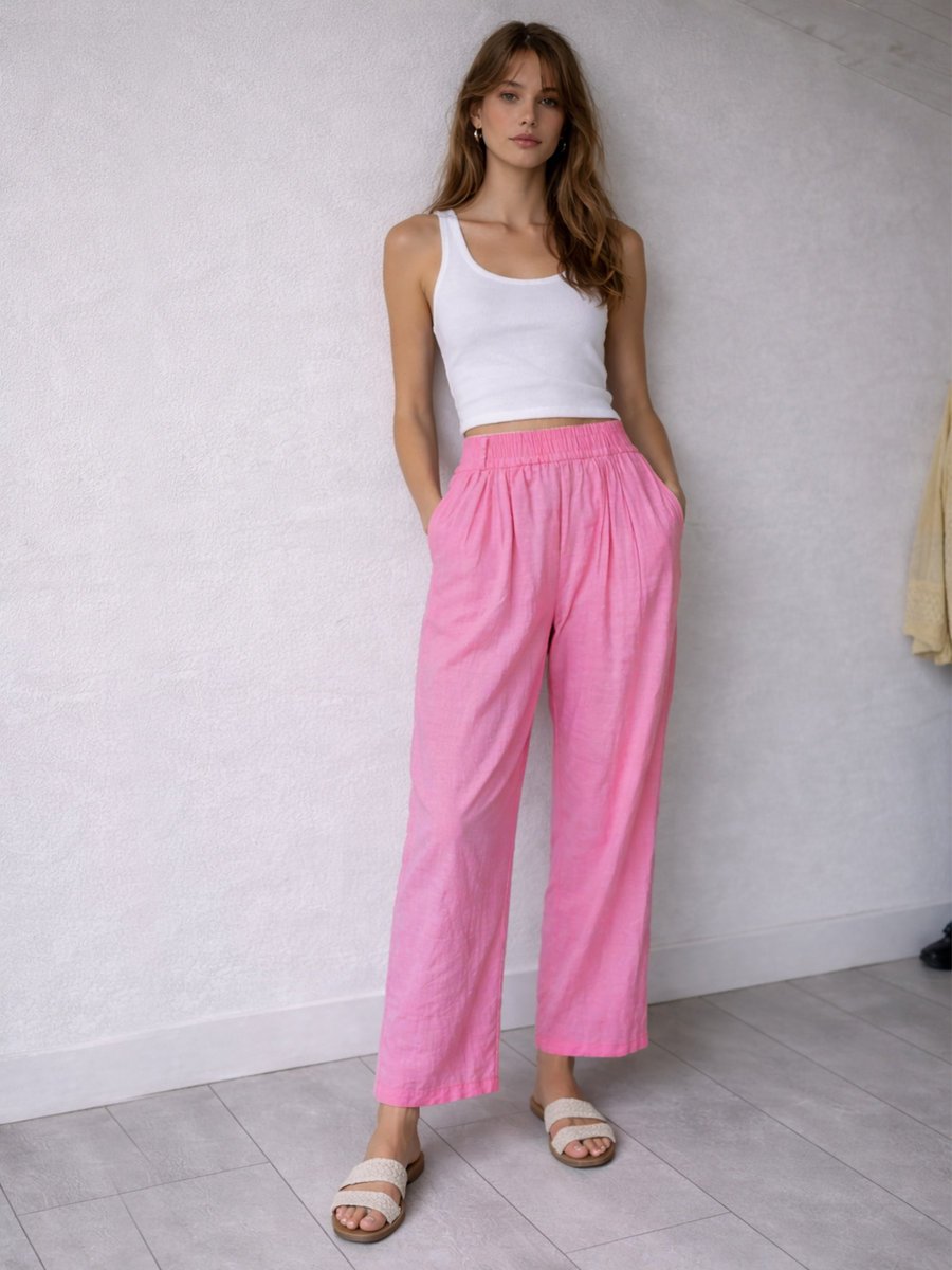 Materiałowe spodnie z kieszeniami różowy L