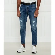 Spodnie męskie - HUGO Jeansy 634 Tapered fit - miniaturka - grafika 1