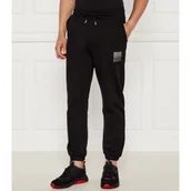 Dresy męskie - HUGO Spodnie dresowe Dusplitan | Loose fit - miniaturka - grafika 1