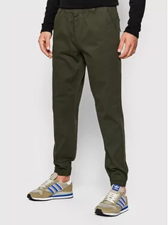 Spodnie damskie - Outhorn Spodnie materiałowe SPMC602 Zielony Regular Fit - grafika 1