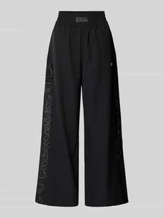 Spodnie typu track pants z szeroką nogawką i lampasami - Spodnie sportowe damskie - miniaturka - grafika 1
