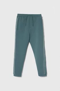 Spodnie i spodenki dla chłopców - Emporio Armani spodnie dresowe dziecięce kolor zielony z aplikacją - grafika 1