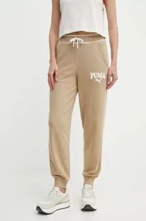 Spodnie damskie - Puma spodnie dresowe SQUAD kolor beżowy z nadrukiem 677901 - grafika 1