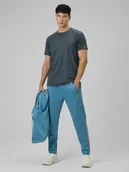 Spodnie sportowe męskie - 4F Spodnie treningowe szybkoschnące męskie - granatowe XXL - miniaturka - grafika 1