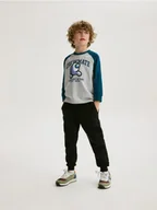 Spodnie i spodenki dla chłopców - Reserved - Dresowe spodnie jogger - czarny - miniaturka - grafika 1