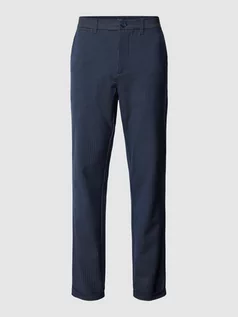 Spodnie męskie - Spodnie materiałowe ze wzorem w paski model ‘liam’ - grafika 1